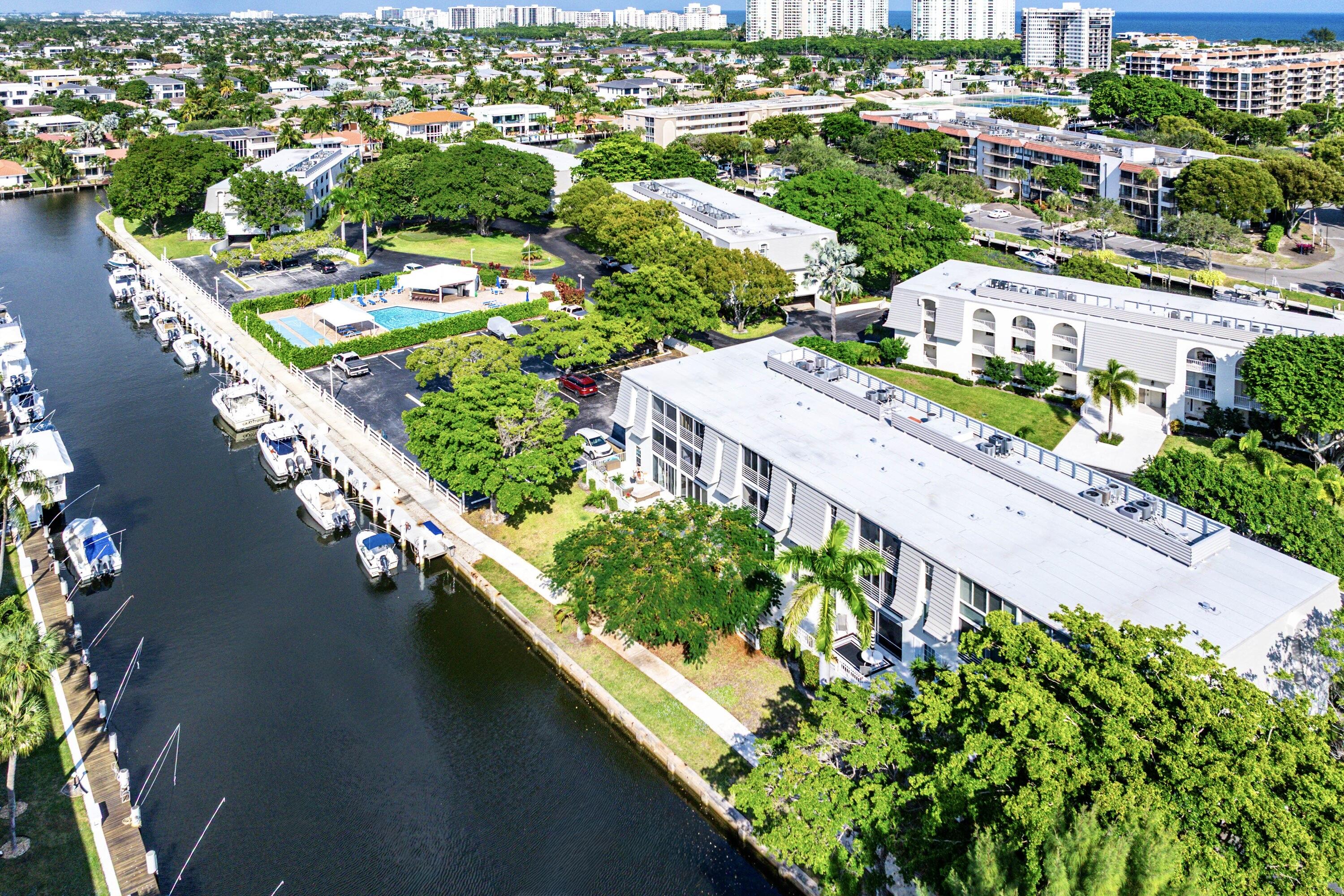 765 Jeffery Street, Unit 1203 Boca Raton, FL 33487 - Photo 30 of 31 an aerial view of residential houses with outdoor space and swimming pool