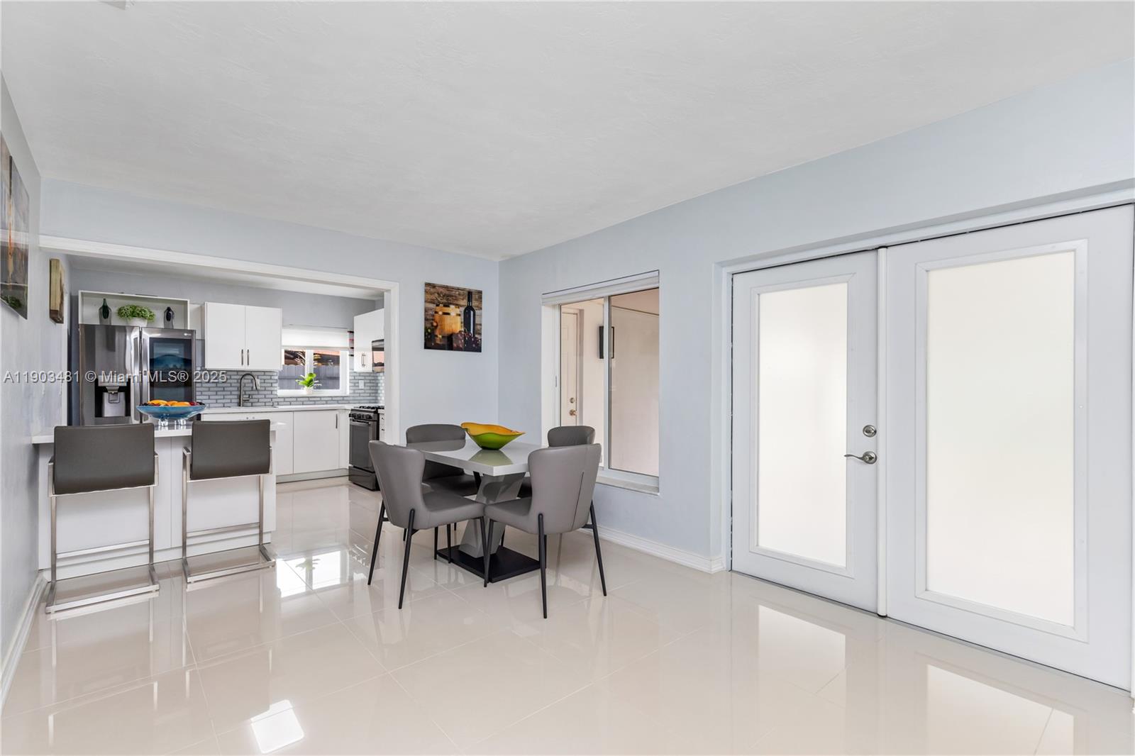 2670 Southwest 119th Court Miami, FL 33175 - Photo 11 of 39 a view of a dining room with furniture and a window