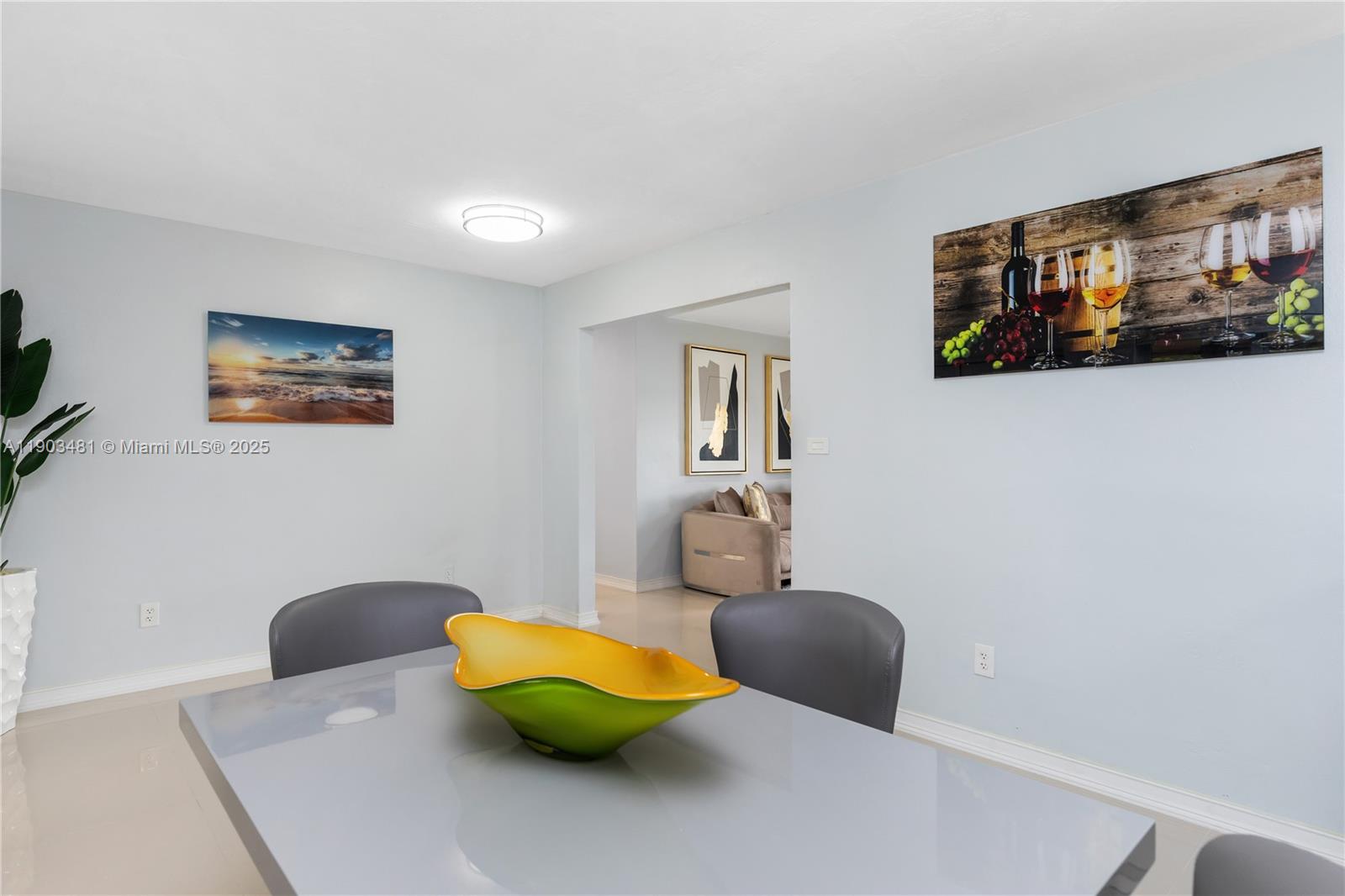 2670 Southwest 119th Court Miami, FL 33175 - Photo 17 of 39 a living room with furniture and a large mirror