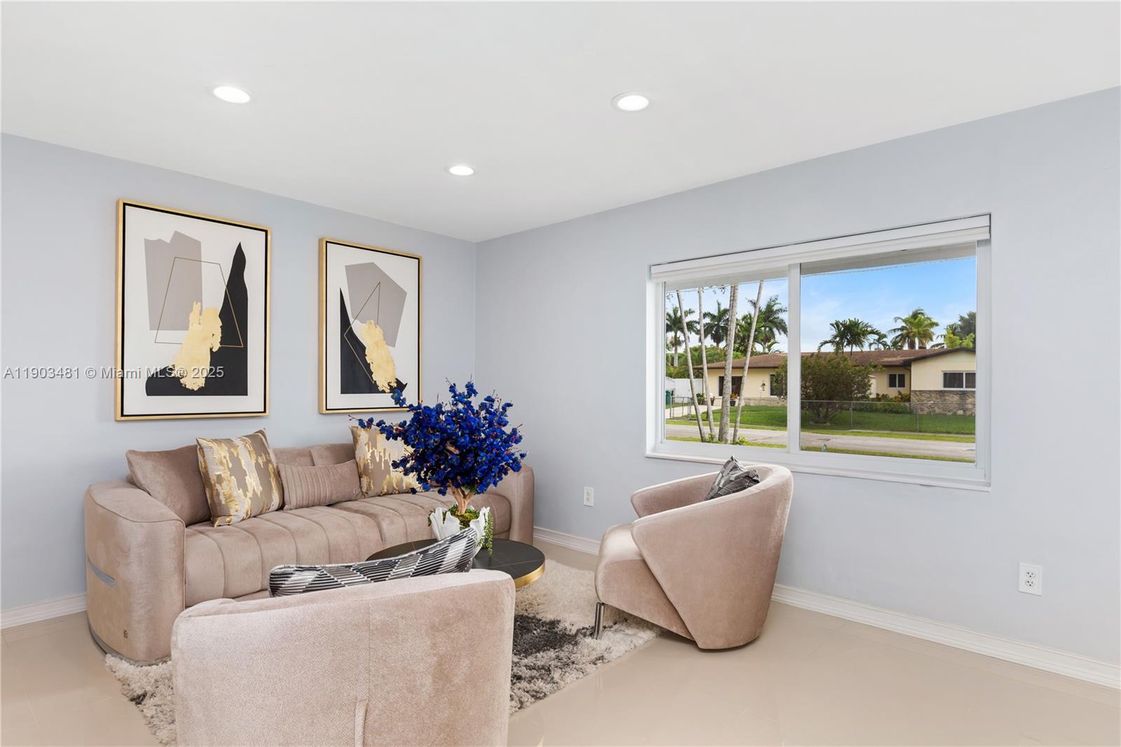 2670 Southwest 119th Court Miami, FL 33175 - Photo 8 of 39 a living room with furniture and a potted plant