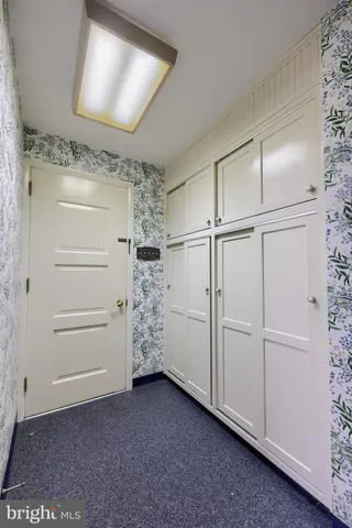 a kitchen with stainless steel appliances a refrigerator and a stove