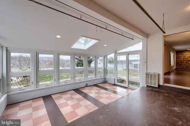a room with window and a wooden floor
