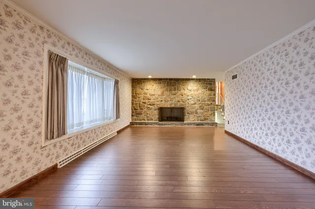 an empty room with windows