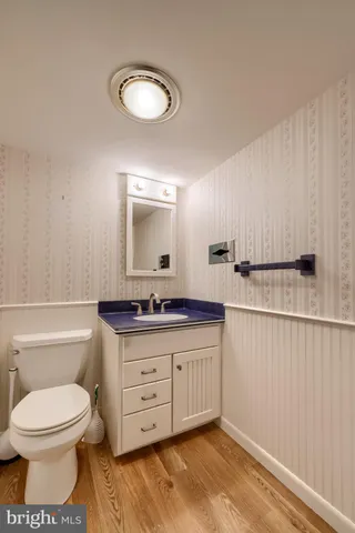 a front view of a house with a yard and pathway