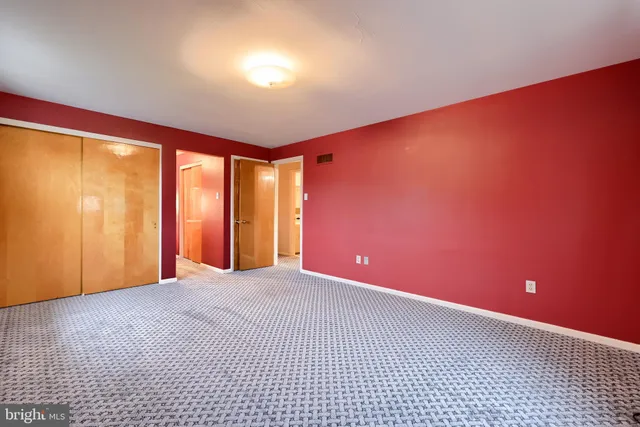 an aerial view of a house with yard swimming pool and outdoor seating