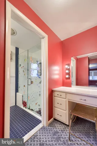 an aerial view of residential houses with outdoor space and swimming pool