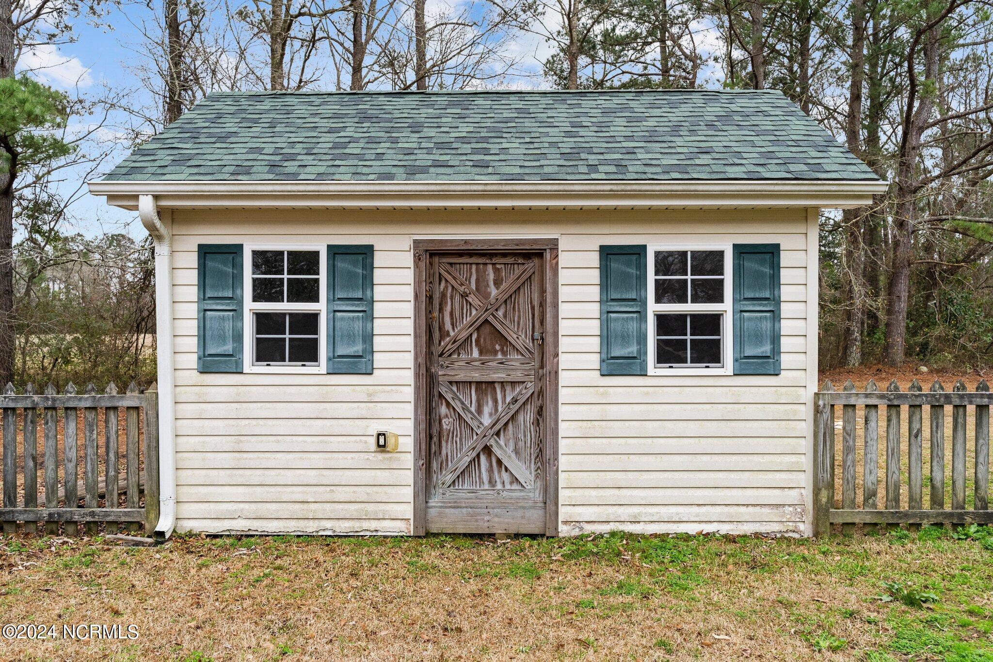 414 Governors Road Southeast Winnabow, NC 28479 - Photo 27 of 31 shed