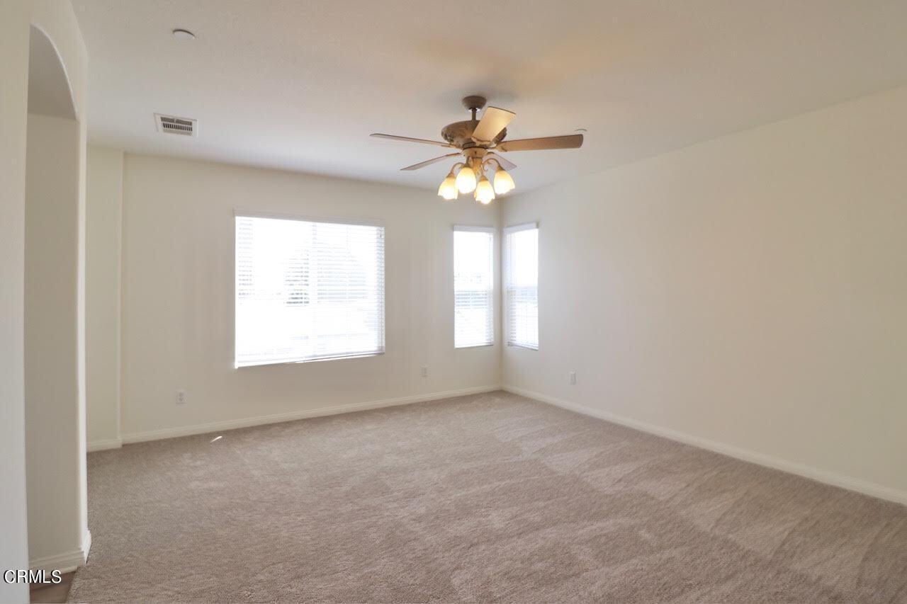 5200 Edgar Street Oxnard, CA 93033 - Photo 17 of 20 an empty room with a window and a fan