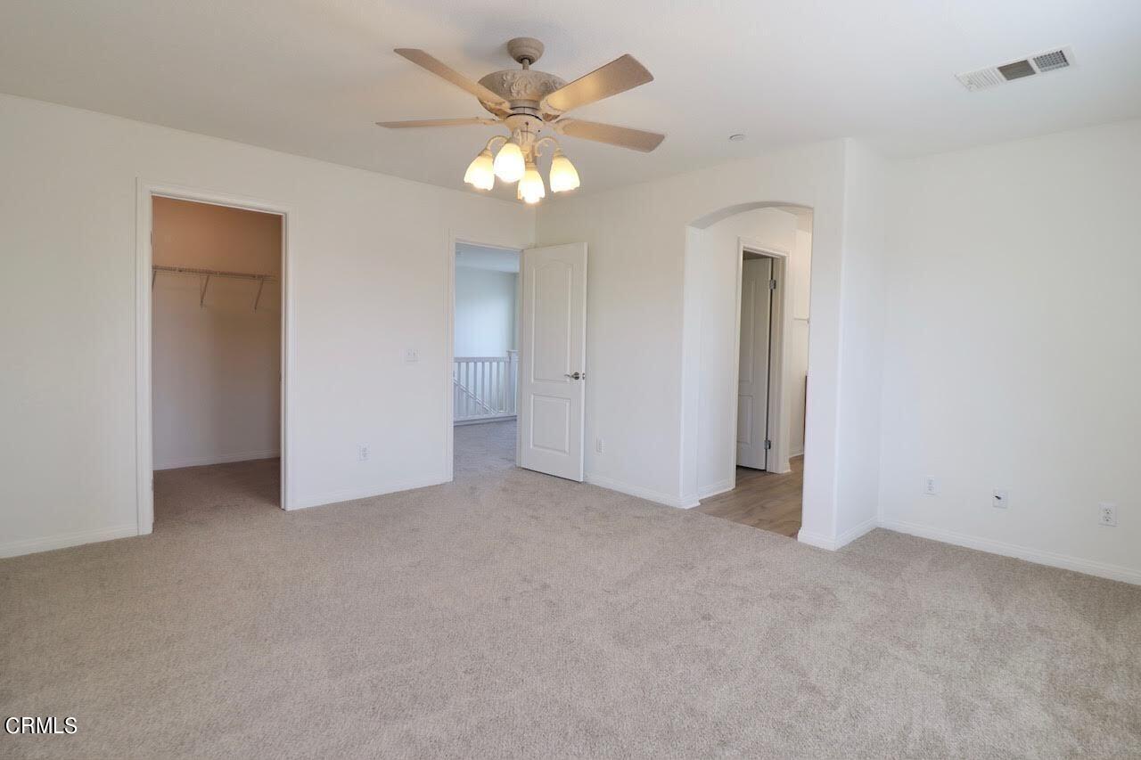 5200 Edgar Street Oxnard, CA 93033 - Photo 18 of 20 an empty room with chandelier fan