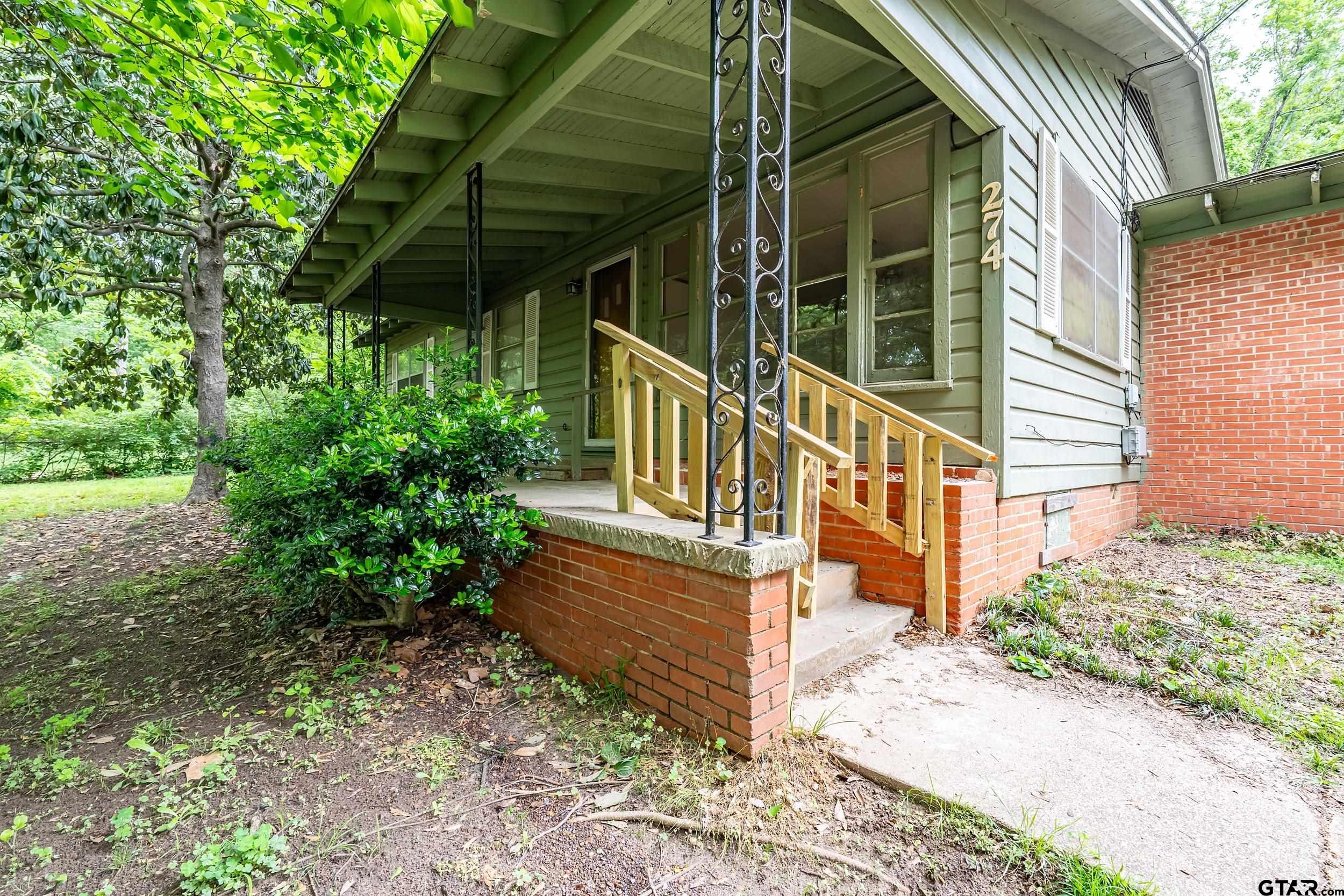 274 West Hill Street Rusk, TX 75785 - Photo 2 of 26 a view of a house with a yard