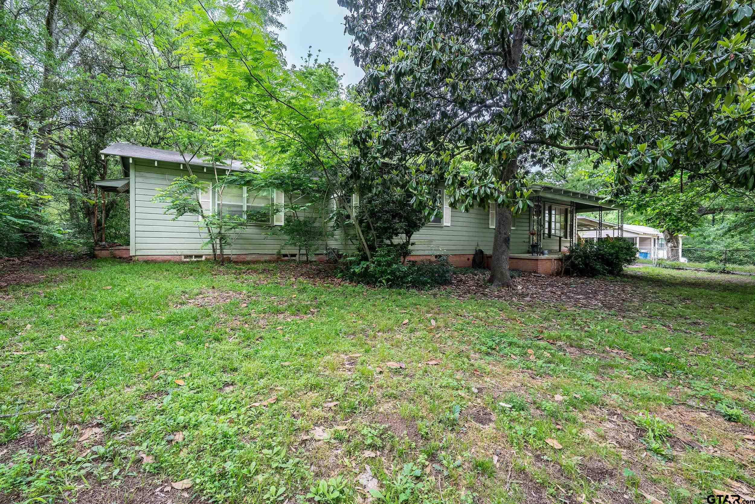274 West Hill Street Rusk, TX 75785 - Photo 3 of 26 a view of a house with a yard