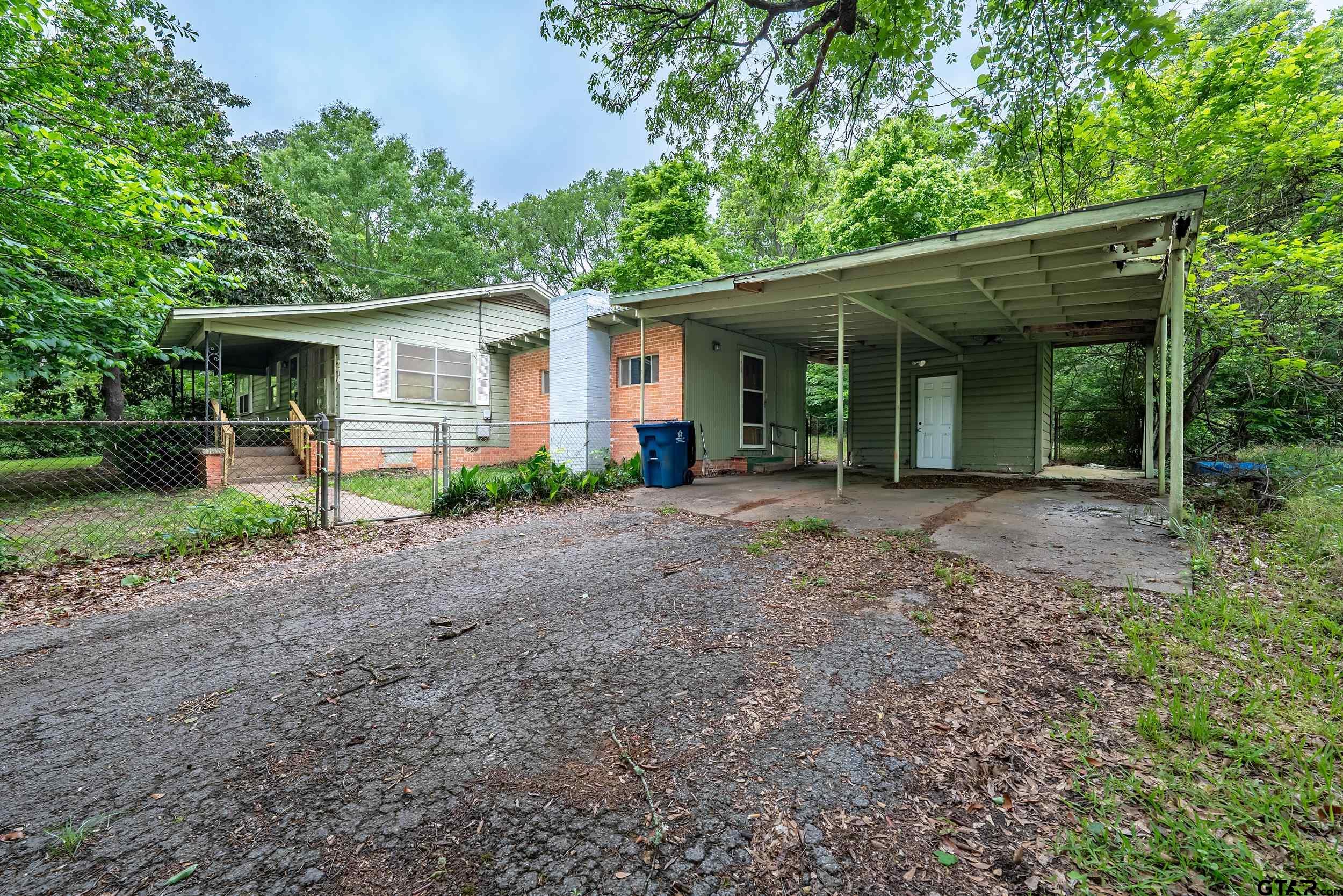 274 West Hill Street Rusk, TX 75785 - Photo 4 of 26 front view of a house with a yard and an trees