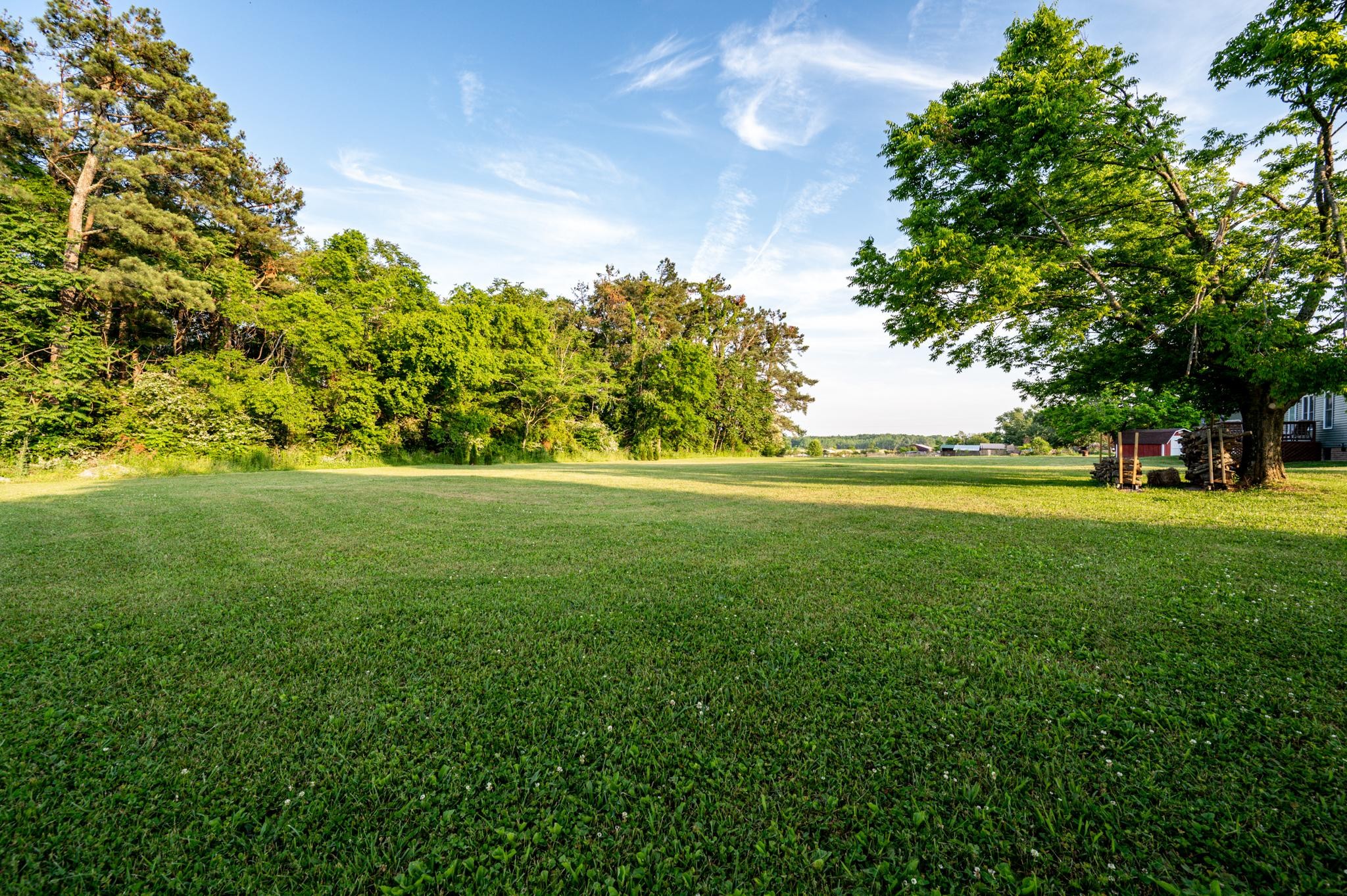 8284 Fredonia Road Manchester, TN 37355 - Photo 17 of 25 a view of grassy field with benches
