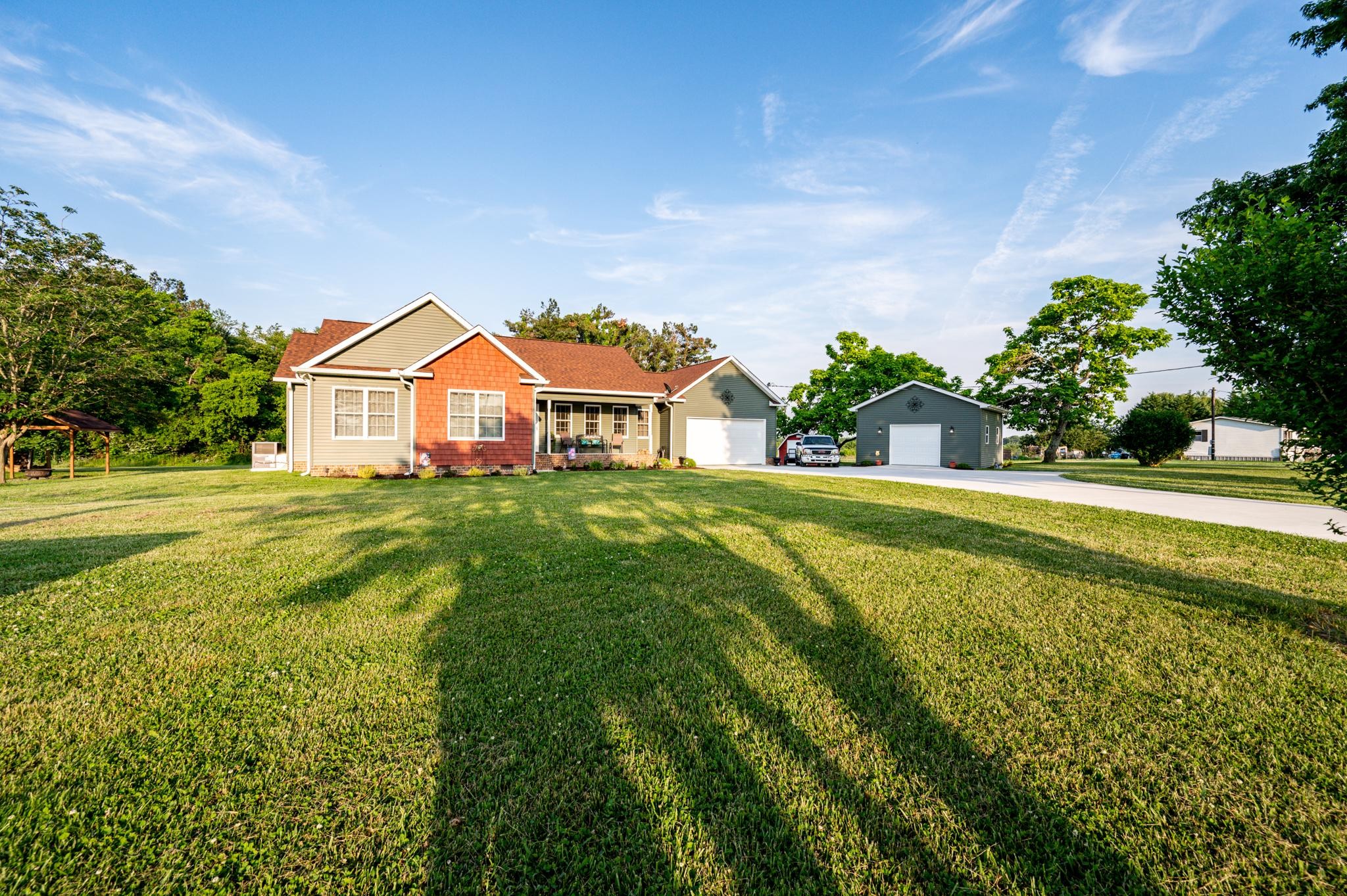 8284 Fredonia Road Manchester, TN 37355 - Photo 3 of 25 a house with swimming pool in front of it