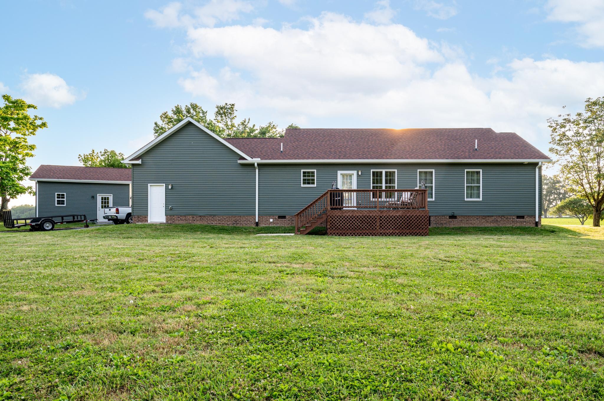 8284 Fredonia Road Manchester, TN 37355 - Photo 21 of 25 a front view of a house with a garden