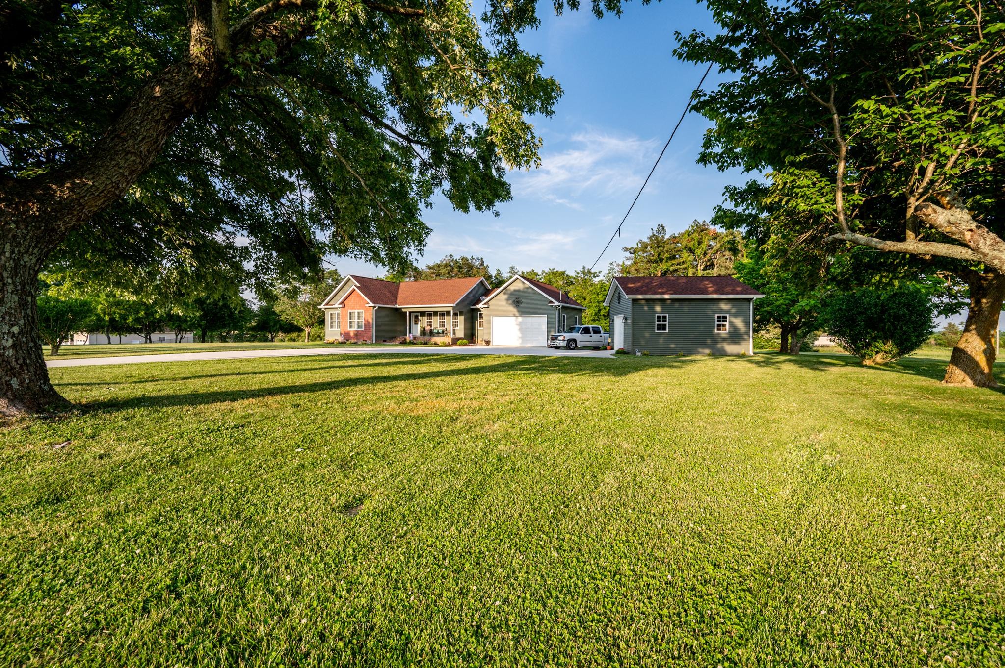 8284 Fredonia Road Manchester, TN 37355 - Photo 23 of 25 a view of a house with a swimming pool