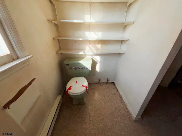 a view of a room with shelves