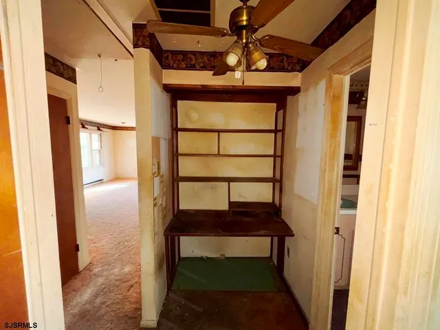 a view of entryway with a front door