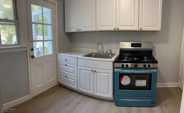 a bathroom with a sink toilet and bathtub