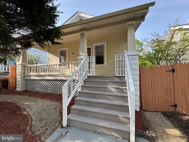 a view of a deck with furniture