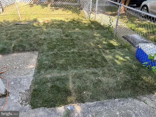 a stove top oven sitting inside of a kitchen