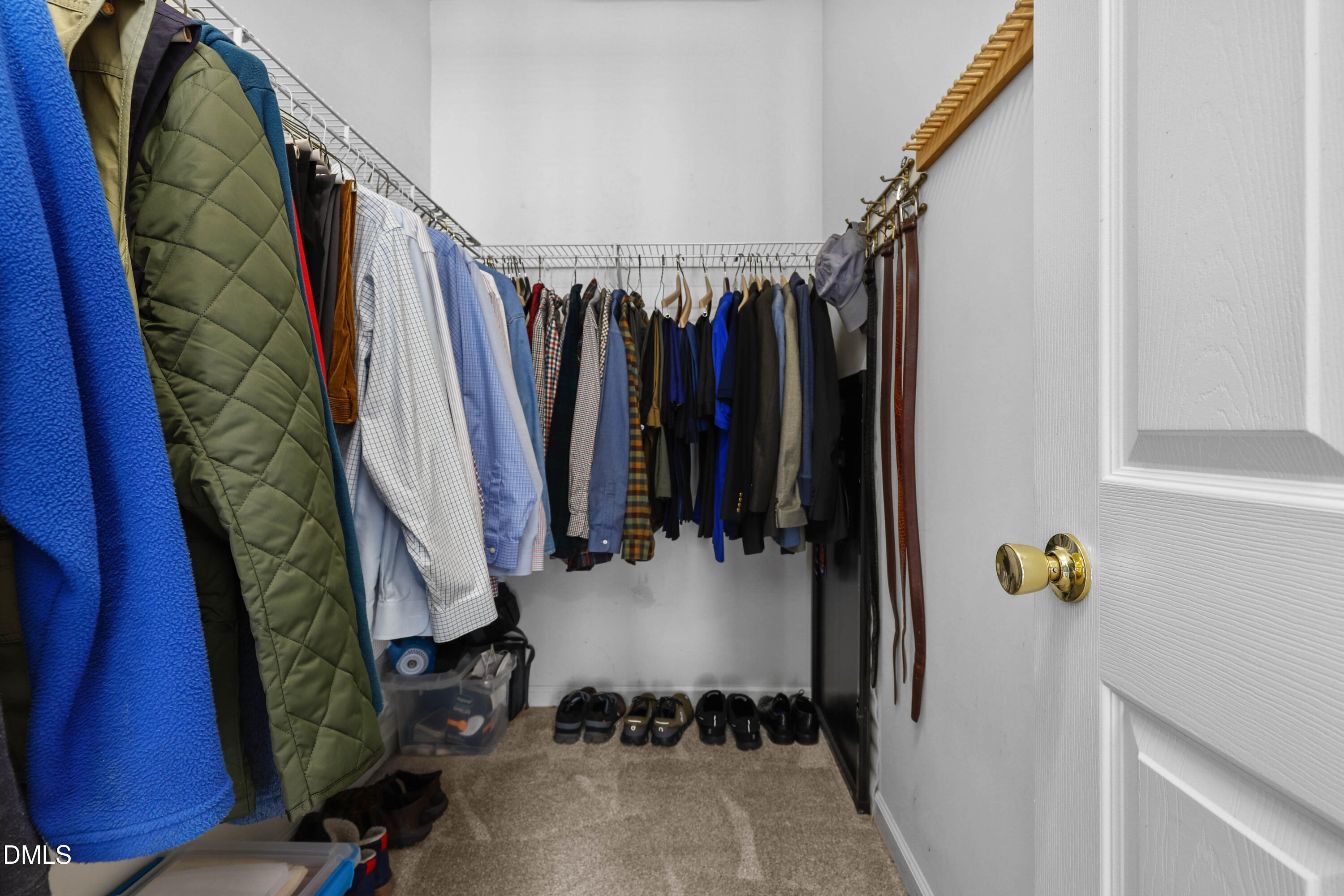 2005 Misty Fog Court Raleigh, NC 27603 - Photo 24 of 42 a view of walk in closet with clothes and shoes