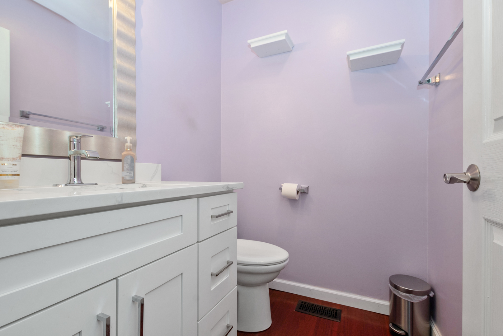 13 Oakview Road Matteson, IL 60443 - Photo 11 of 23 a bathroom with a sink a toilet and a mirror