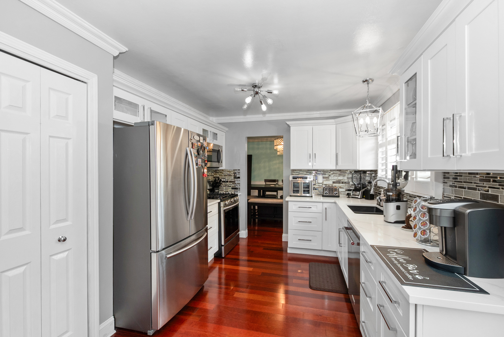 13 Oakview Road Matteson, IL 60443 - Photo 3 of 23 a kitchen with a refrigerator and a stove top oven