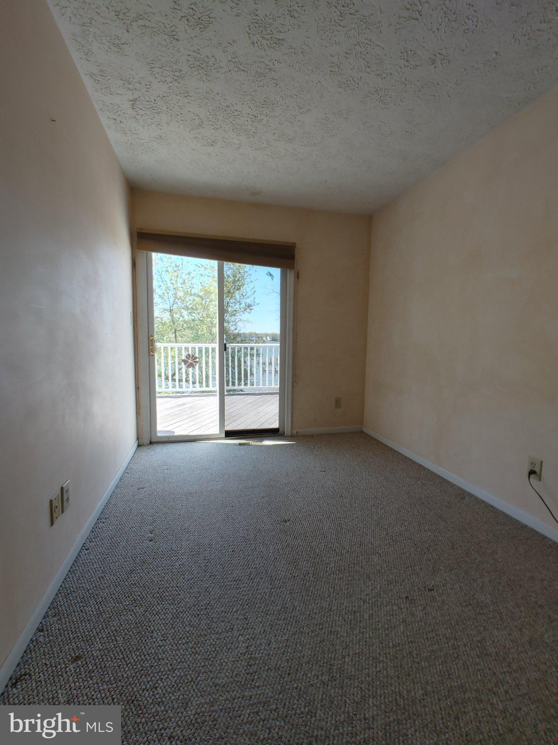 204 Granada Road Pasadena, MD 21122 - Photo 13 of 24 Bright space with balcony access.