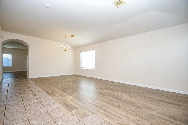 a view of an empty room and window