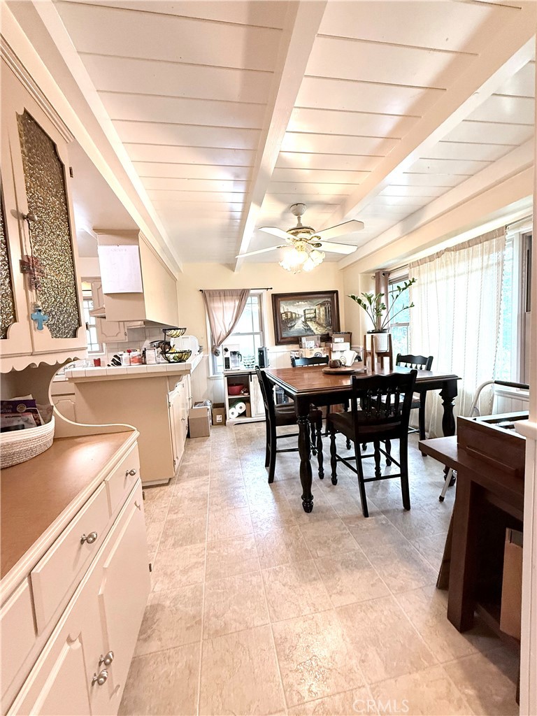 970 West 8th Street San Pedro, CA 90731 - Photo 13 of 22 a room with stainless steel appliances kitchen island granite countertop furniture and a view of kitchen