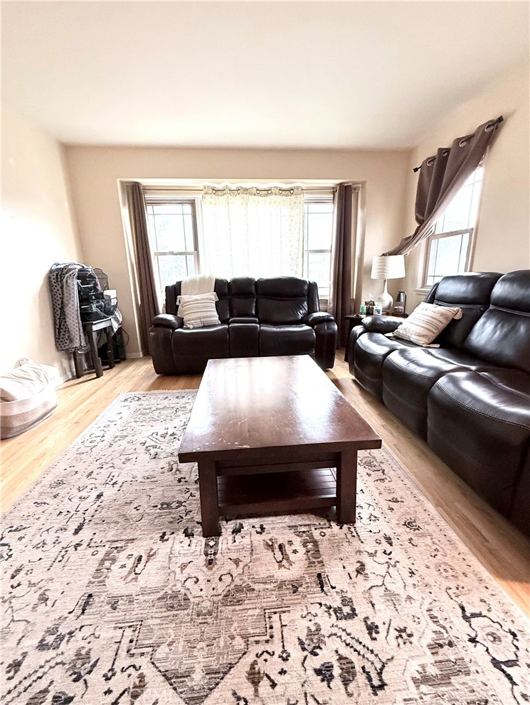 970 West 8th Street San Pedro, CA 90731 - Photo 7 of 22 a living room with furniture and a flat screen tv