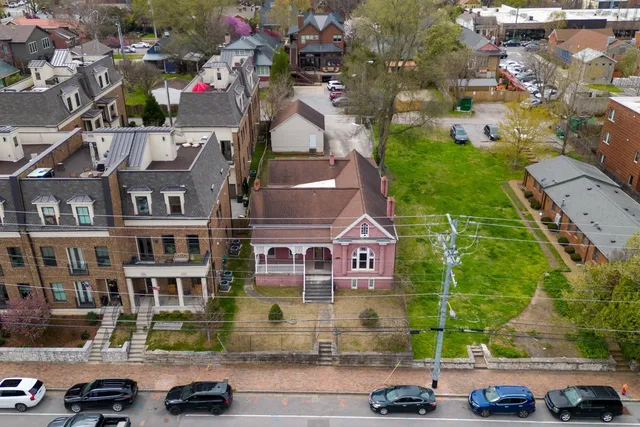 a front view of a building with street view
