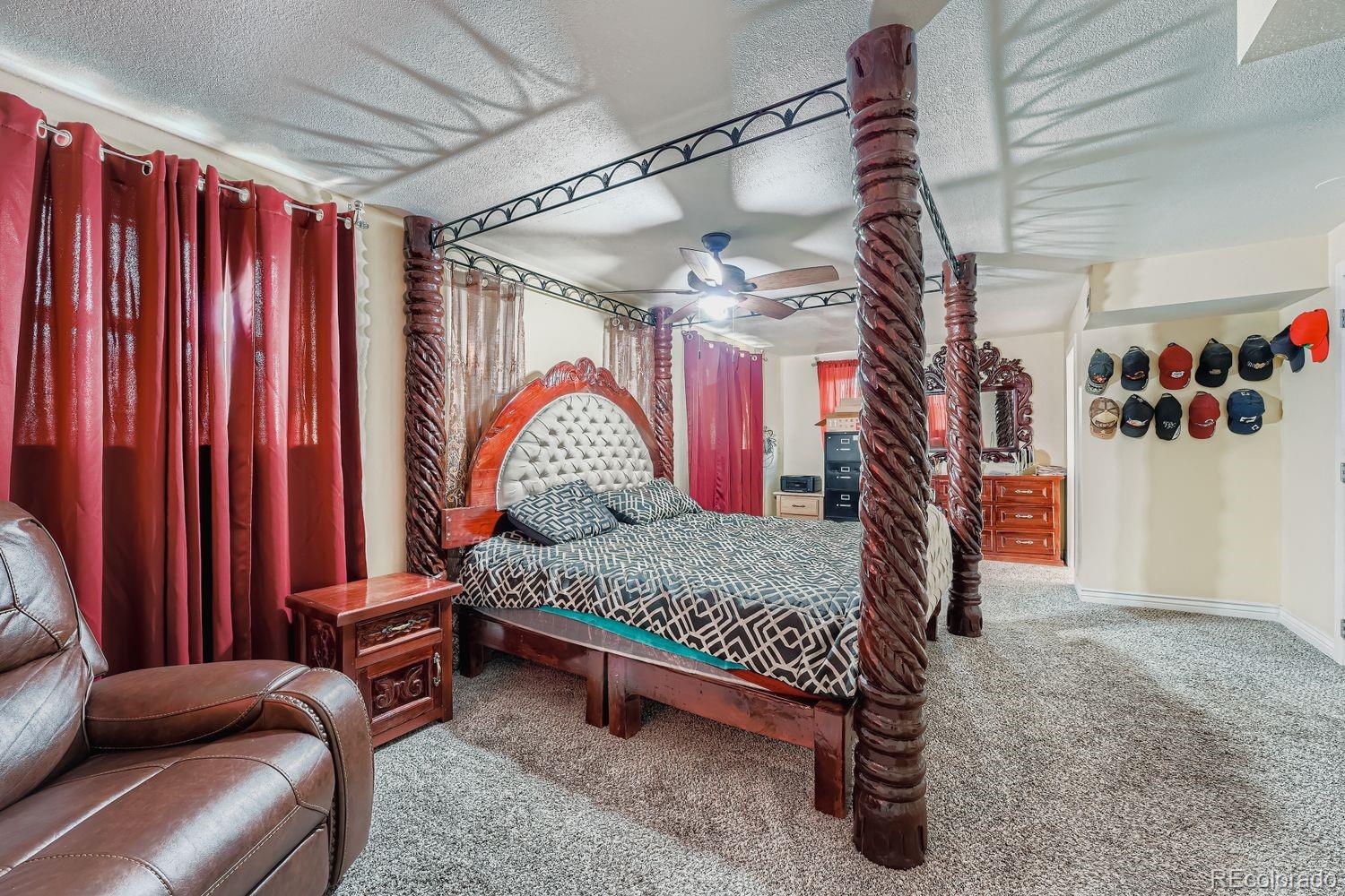 361 East Thomas Avenue Byers, CO 80103 - Photo 21 of 28 a living room with furniture a couch and a chandelier
