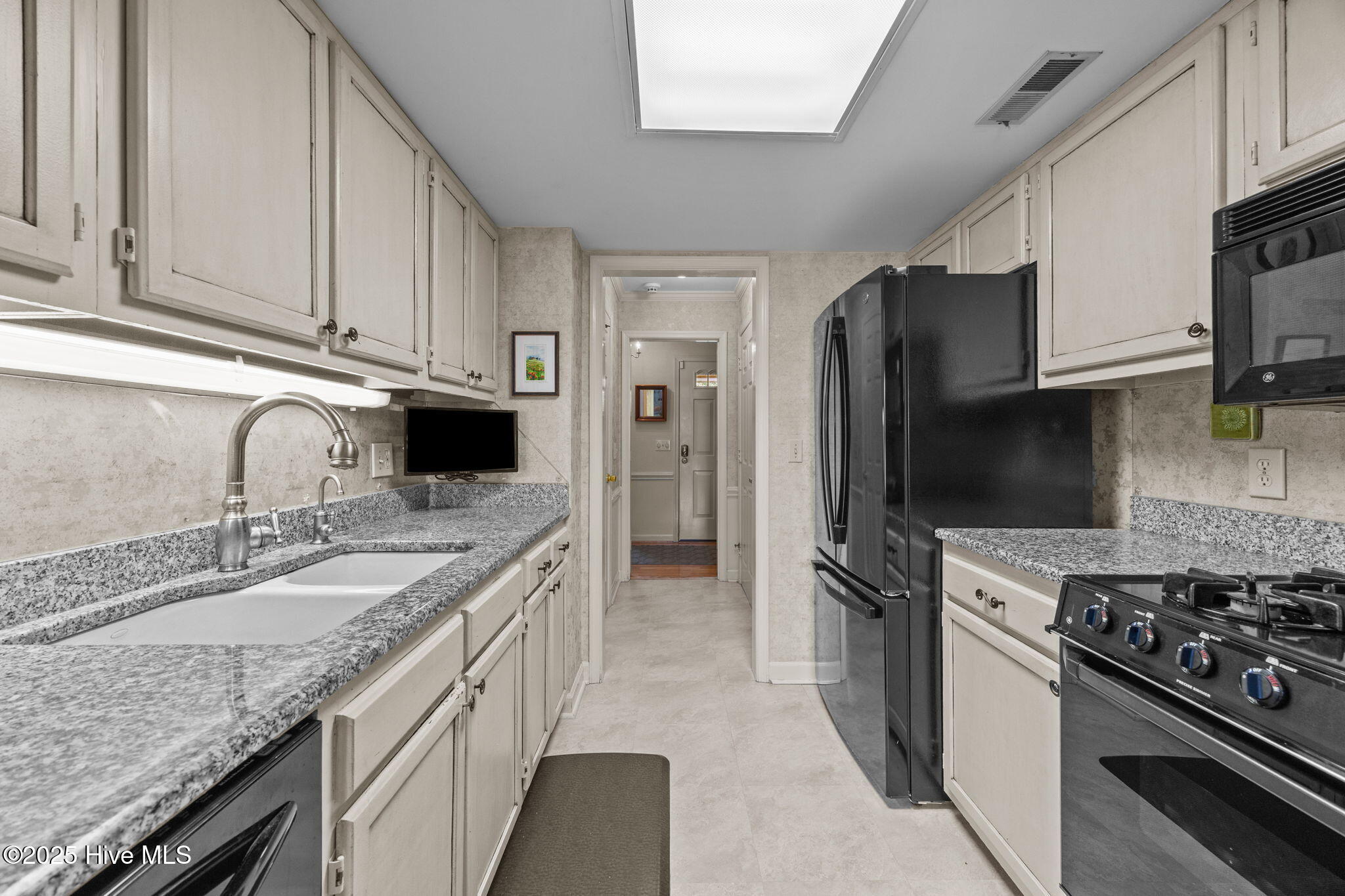 1874 Quail Ridge Road, Unit E Greenville, NC 27858 - Photo 16 of 55 Kitchen. Please note: the refrigerator and stove pictured do not convey.