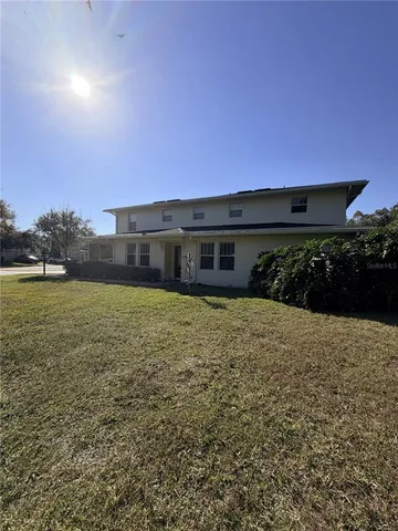 a large house with a yard