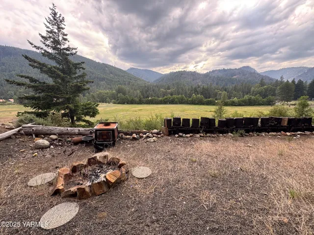 a view of a lake with a car parked