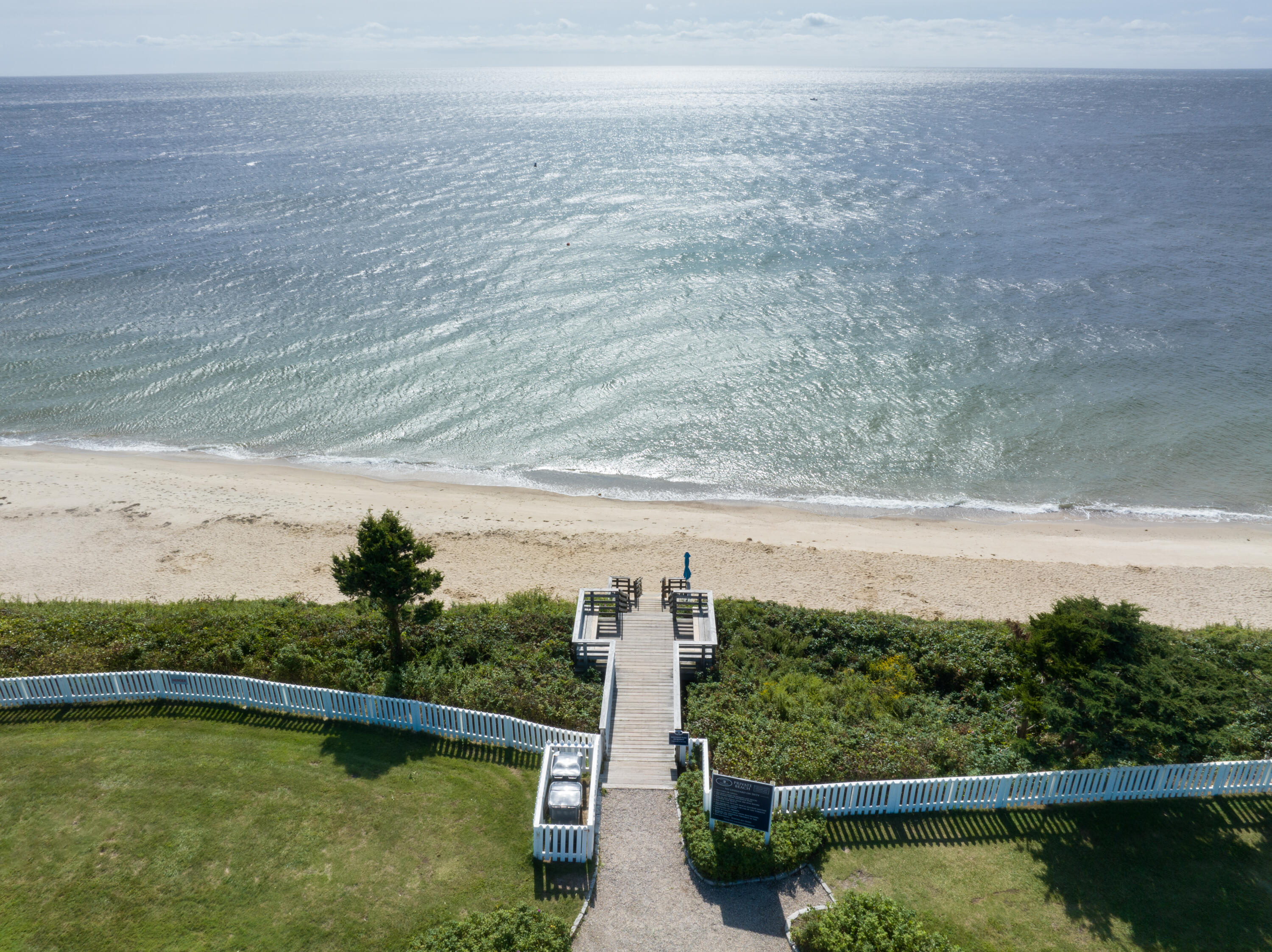 3 Hydrangea Lane Mashpee, MA 02649 - Photo 14 of 18 a view of a lake with a mountain in the background