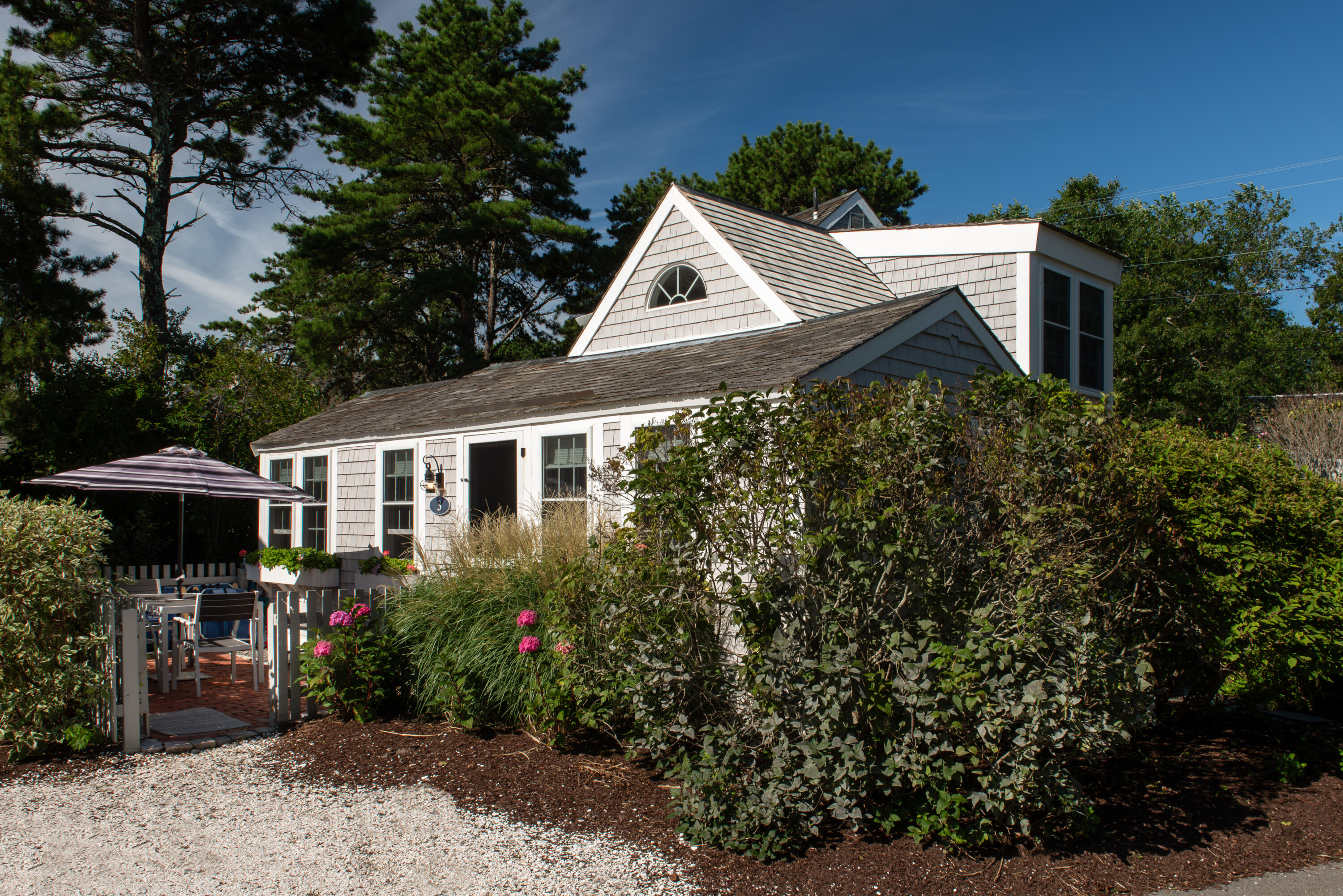 3 Hydrangea Lane Mashpee, MA 02649 - Photo 3 of 18 a front view of a house with yard and green space