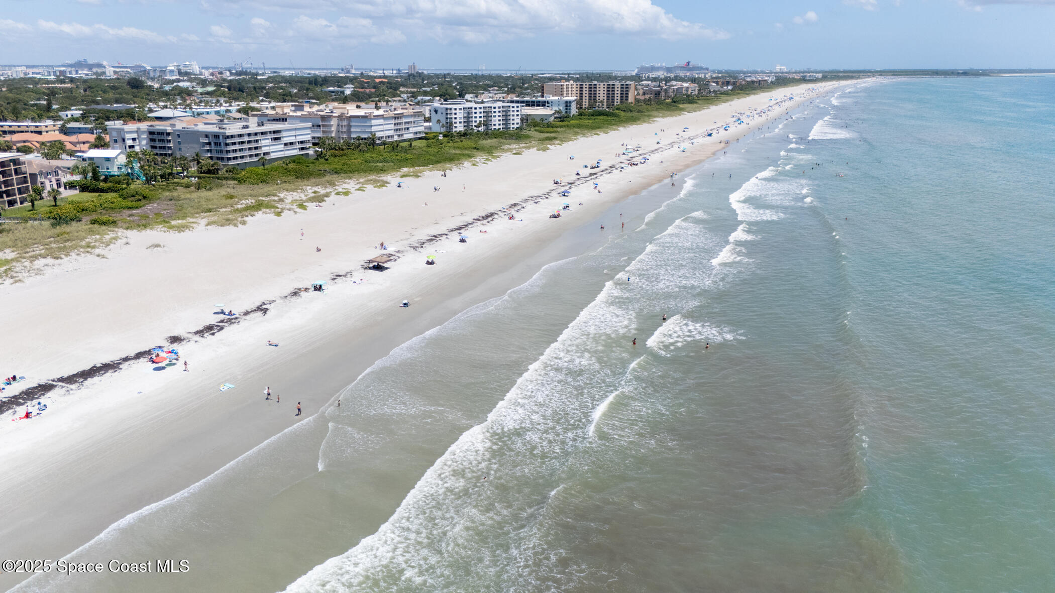 6770 Ridgewood Avenue, Unit 301 Cocoa Beach, FL 32931 - Photo 25 of 44 a view of a city