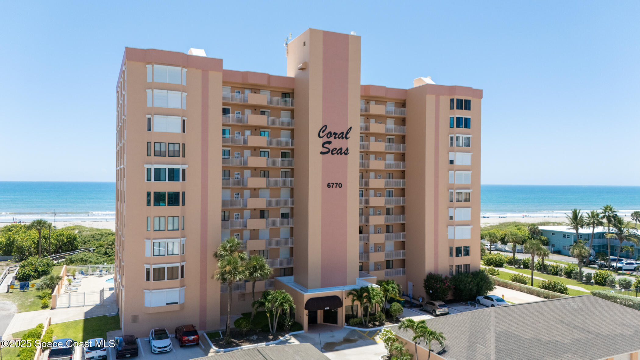 6770 Ridgewood Avenue, Unit 301 Cocoa Beach, FL 32931 - Photo 40 of 44 a front view of a building