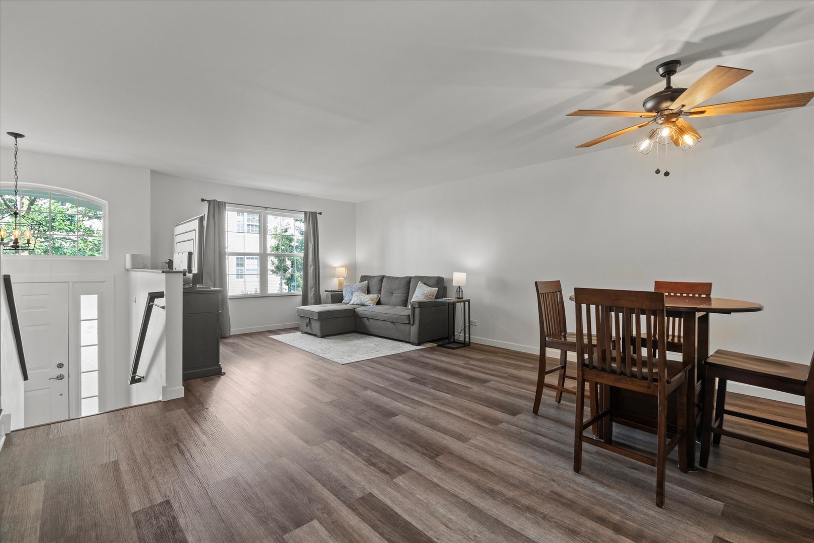 894 Clover Lane Pingree Grove, IL 60140 - Photo 3 of 24 a view of a livingroom with furniture and a ceiling fan