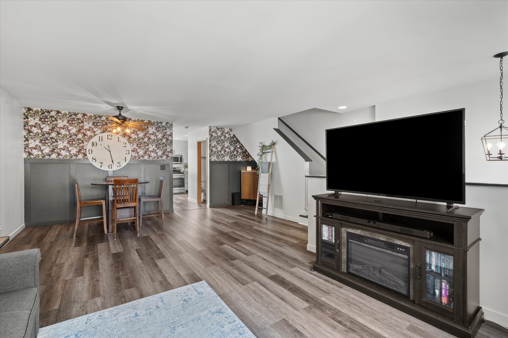 894 Clover Lane Pingree Grove, IL 60140 - Photo 4 of 24 a living room with furniture and a flat screen tv