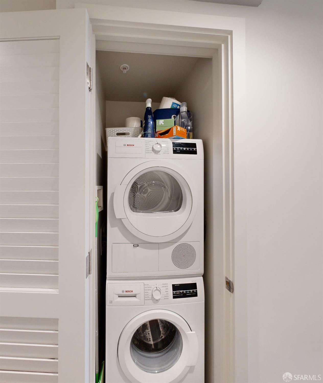 1238 Sutter Street, Unit 303 San Francisco, CA 94109 - Photo 15 of 15 a utility room with dryer and washer