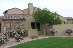 4700 South Fulton Ranch Boulevard, Unit 61 Chandler, AZ 85248 - Photo 1 of 1 a front view of a house with garden