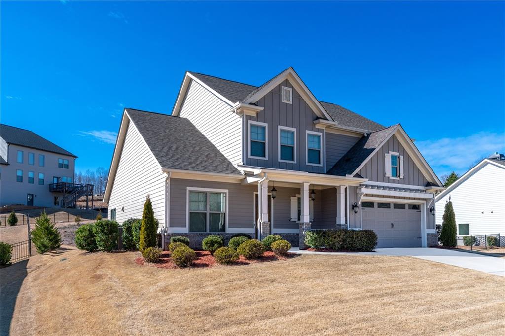 5706 Meadow View Drive Jefferson, GA 30549 - Photo 1 of 47 a front view of a house with a yard