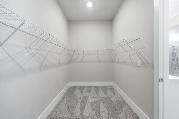 a view of a room with racks on the wall