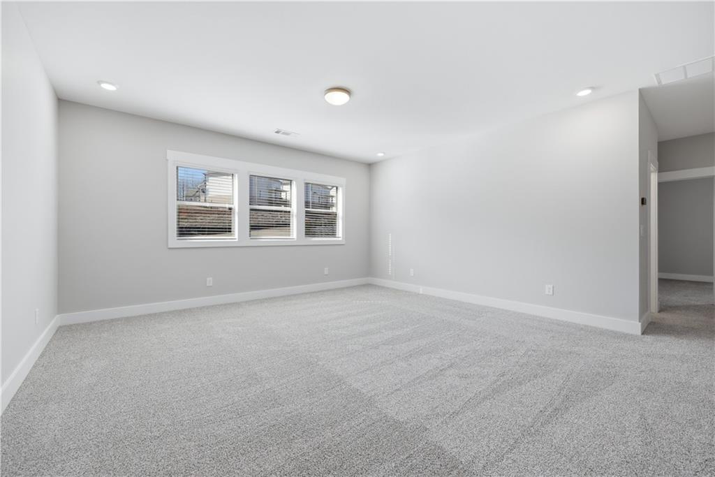 5706 Meadow View Drive Jefferson, GA 30549 - Photo 30 of 47 an empty room with windows
