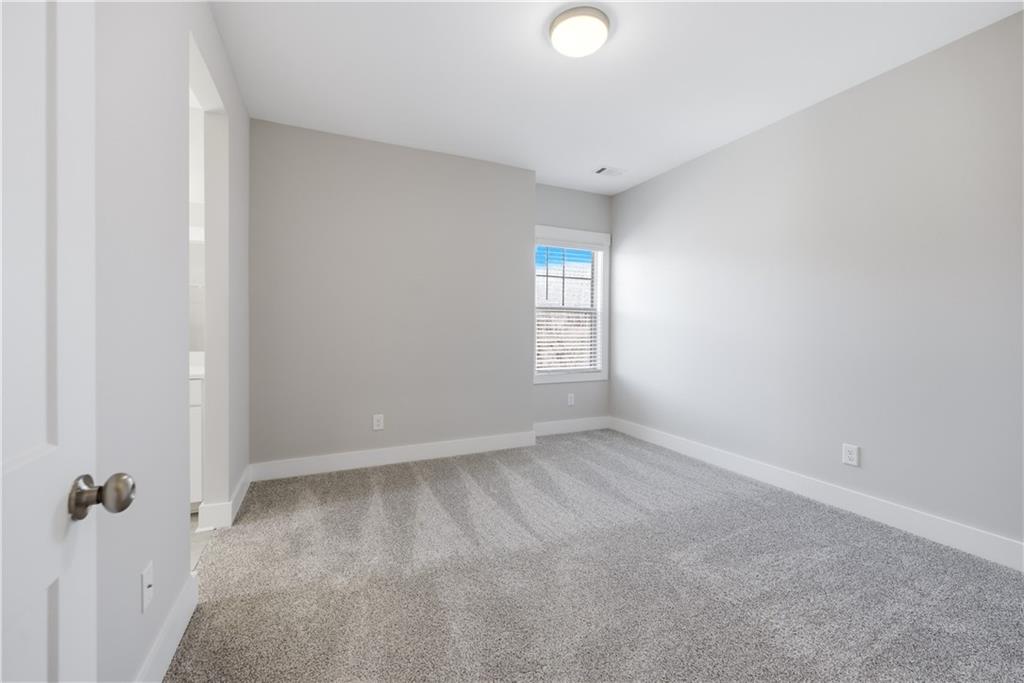 5706 Meadow View Drive Jefferson, GA 30549 - Photo 40 of 47 an empty room with windows