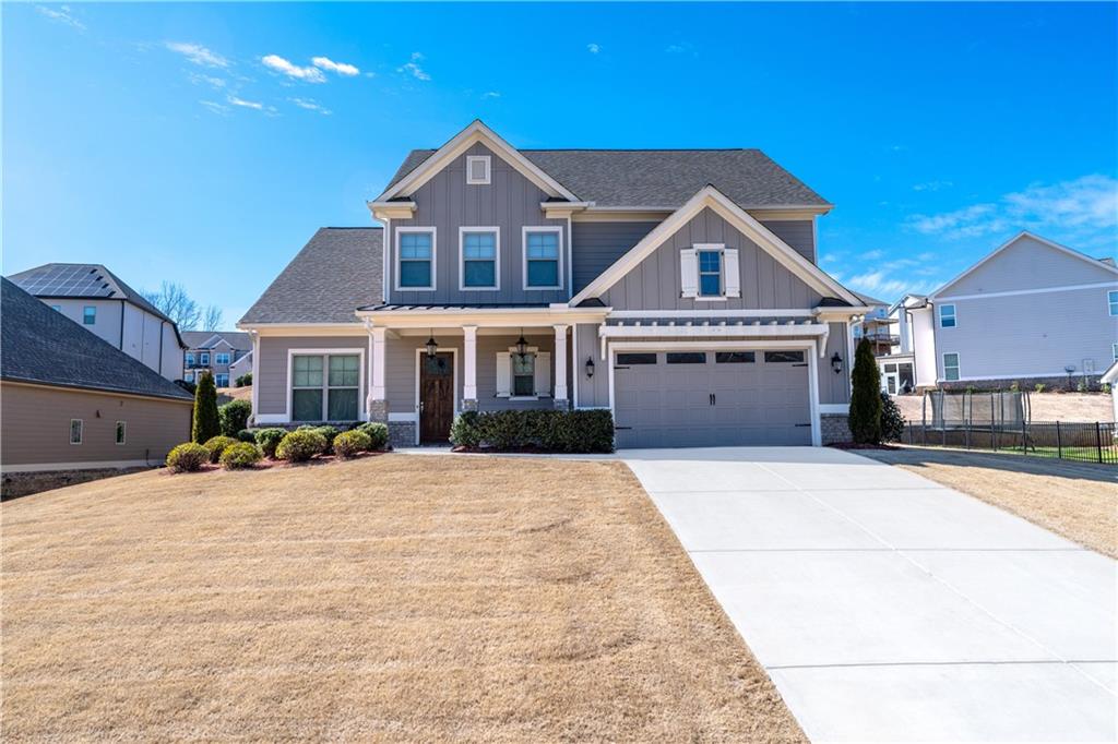 5706 Meadow View Drive Jefferson, GA 30549 - Photo 4 of 47 a front view of a house with yard